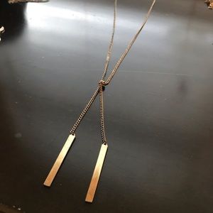 Long gold necklace